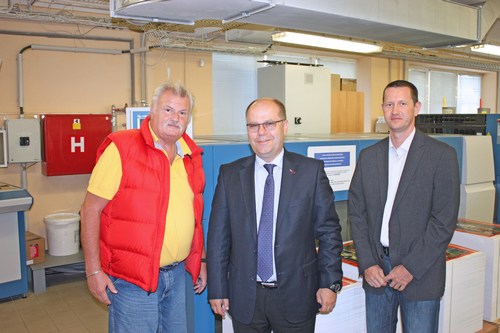 L-r: Miloslav Kyjevsky, owner of the printing firm, Jan Korenc, managing director of KBA CEE, and Bohuslav Polacek, sales at KBA CEE, in front of one of the four new Rapidas